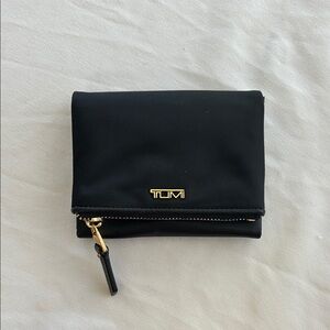 Tumi Black Pouch with Gold Detailing